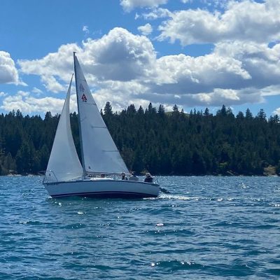 a small boat in a large body of water