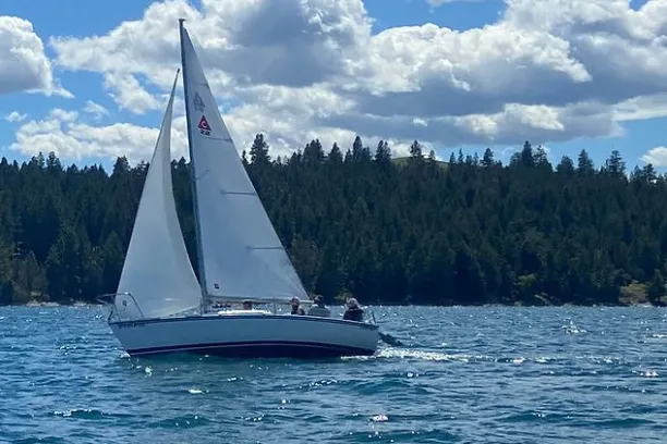 a small boat in a large body of water