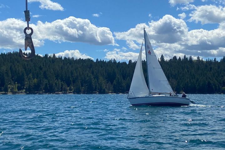 a small boat in a large body of water