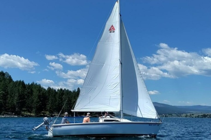 a small boat in a large body of water