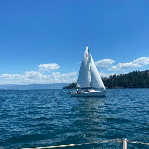 a small boat in a body of water